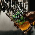 st_patrick_16_oz_tint_glass_Pint_Glass_Dark_Lifestyle_Mockup.png