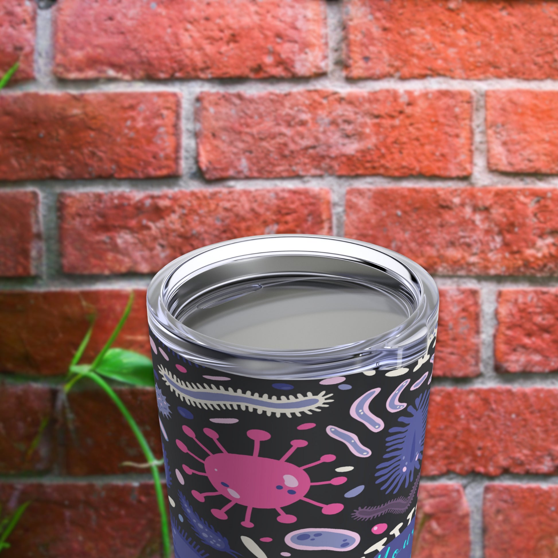 "Custom biology-themed tumbler featuring scientific illustrations and symbols like DNA strands and cells in vibrant colors."
